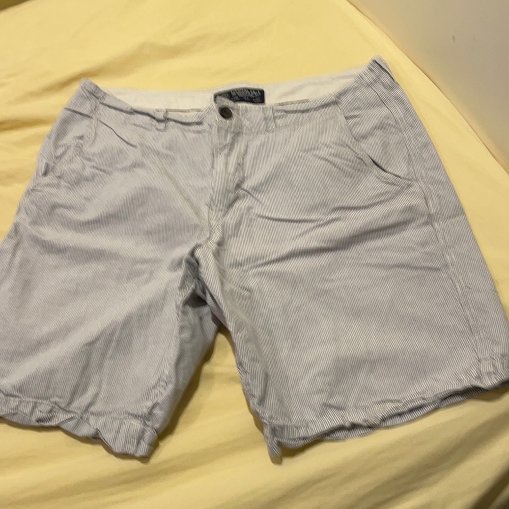 Blue and white pin striped. Worn